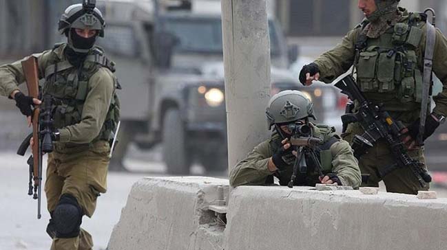 İsrail askerleri işgal altındaki Batı Şeria'nın çeşitli bölgelerinde 22 Filistinliyi