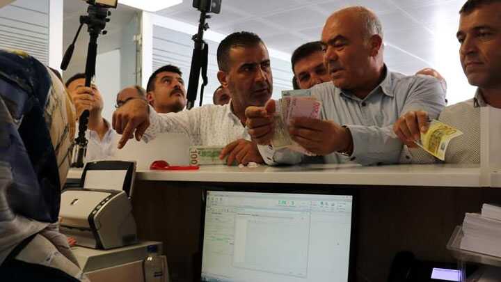 Hatay%E2%80%99daki+i%C5%9F+adamlar%C4%B1ndan+T%C3%BCrk+liras%C4%B1na+destek+